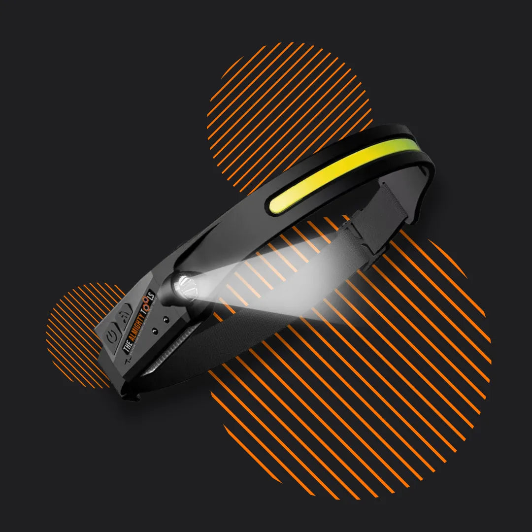 Black LED headlamp with yellow accent and adjustable strap on a dark background with orange lines.