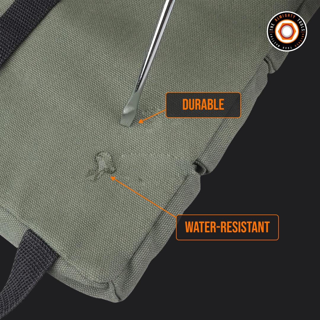 Close-up of green tool roll pouch labeled durable, water-resistant, with screwdriver test.