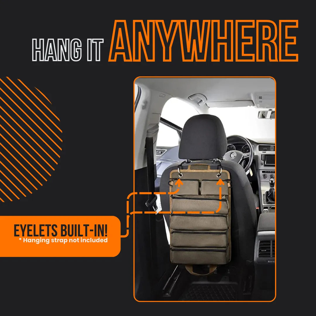 Car organizer bag with built-in eyelets hanging on front seat backrest, interior view