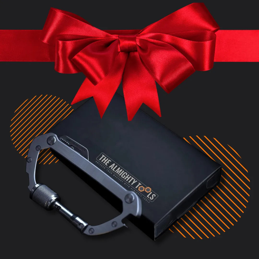 Black Almighty Tools carabiner gift box with red bow on dark background
