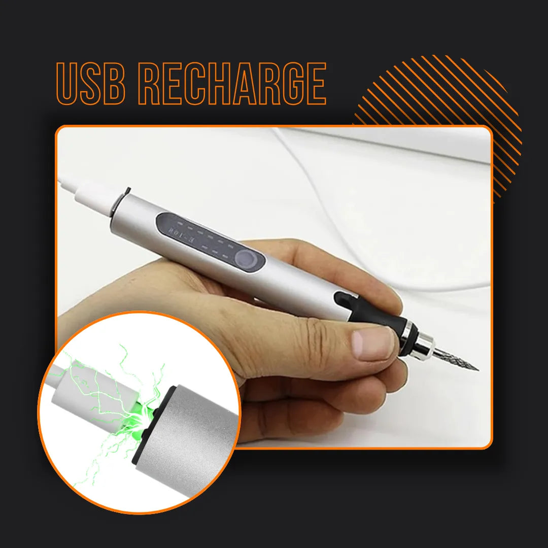 Hand holding a USB rechargeable electric engraver pen with charging indicator