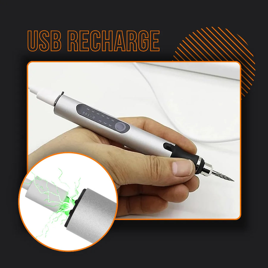 Hand holding a USB rechargeable electric engraver pen with charging indicator