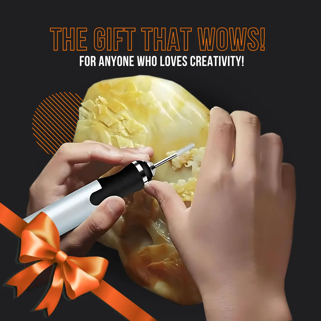 Hands using electric engraver tool on stone with creative gift text and orange ribbon