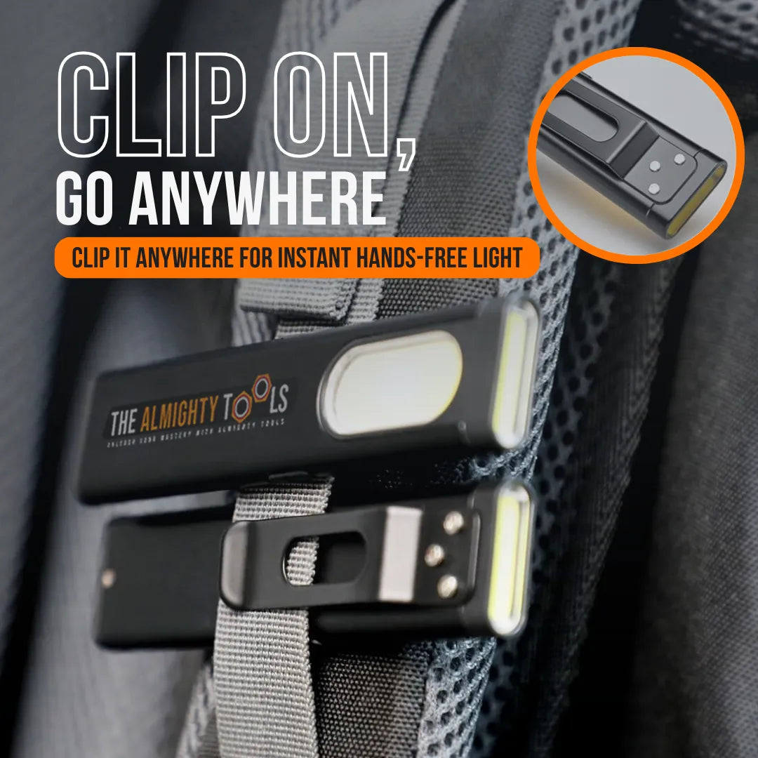 Clip-on mini LED flashlight attached to a backpack strap for hands-free lighting