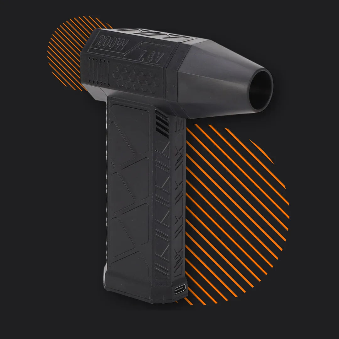 Black handheld cordless electric air duster with geometric grip on dark background