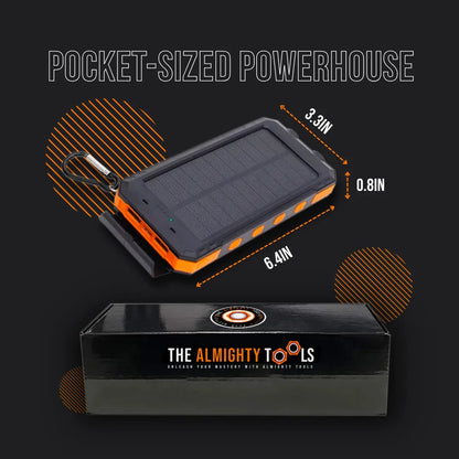 Compact solar power bank with orange accents, dimensions shown, next to The Almighty Tools box.
