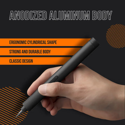 Hand holding black anodized aluminum pen with ergonomic design and durable cylindrical body
